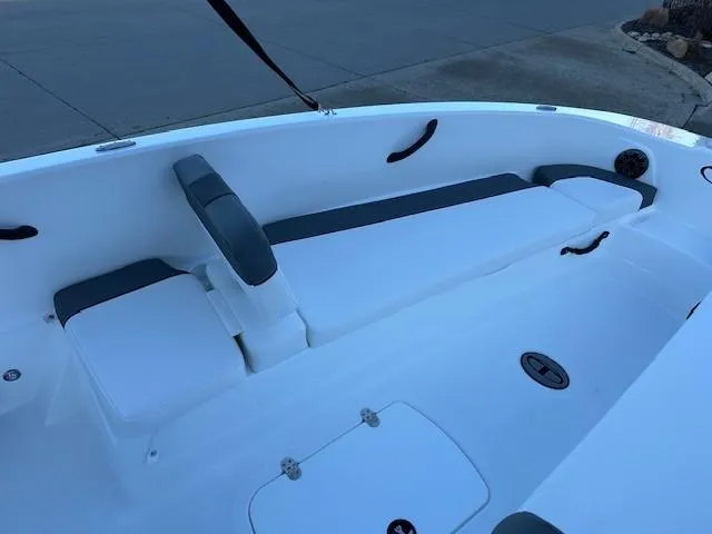 Slide: The Image of 2025 Tahoe T18 boat interior with white seating and gray accents. - 4