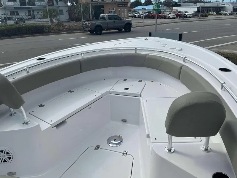 Slide: The Image of 2025 Sportsman 231 Heritage boat interior with seating and storage compartments. - 12