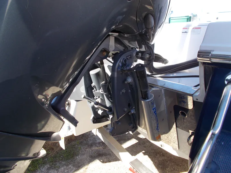 Slide: The Image of Close-up of 2020 Robalo 246 Cayman boat engine and hydraulic system. - 17