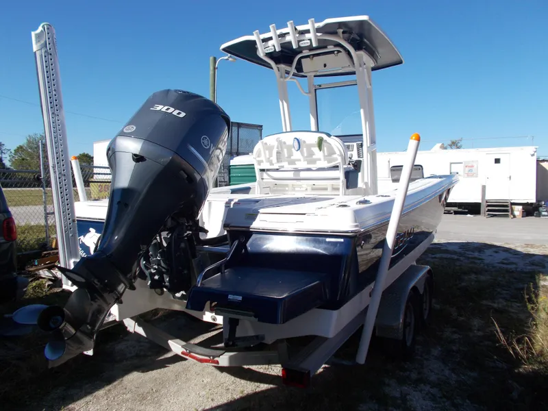 Slide: The Image of 2020 Robalo 246 Cayman boat with powerful outboard motor on trailer. - 4