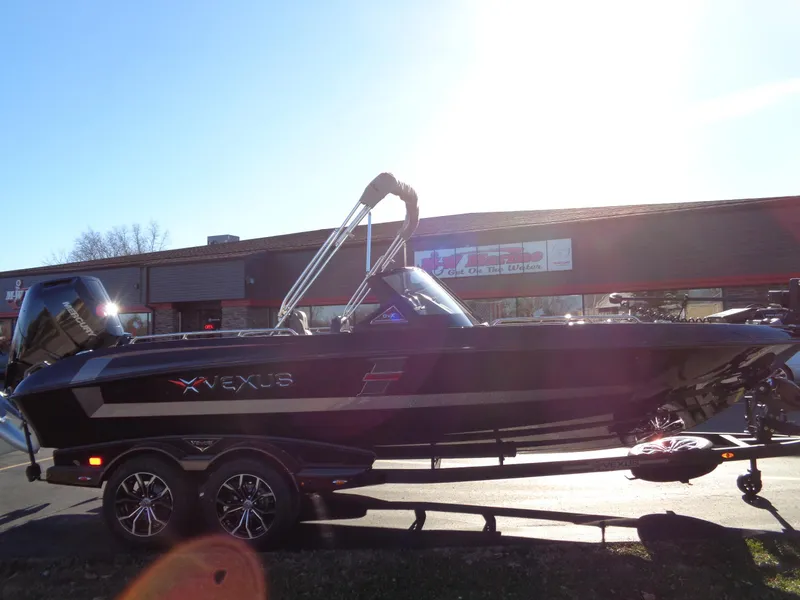 Slide: The Image of 2025 Vexus DVX22S boat on trailer in sunlight. - 12