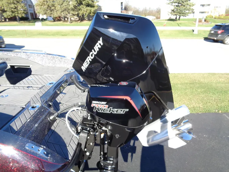 Slide: The Image of 2025 Vexus DVX22S boat with Mercury Pro Kicker outboard motor. - 21
