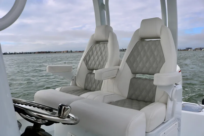 Slide: The Image of Luxurious seating on 2023 Freeman 28 boat with diamond-stitched upholstery. - 23