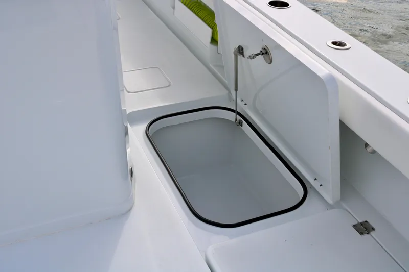 Slide: The Image of Freeman 28 boat interior, 2023 model, featuring an open storage compartment. - 41