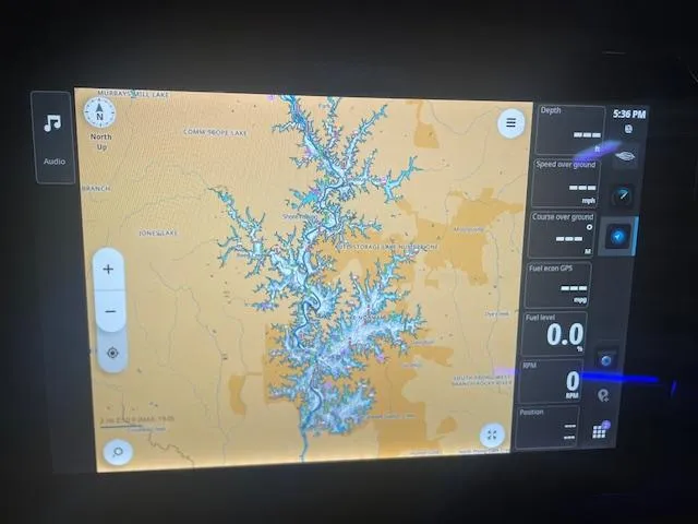 Slide: The Image of Navigation screen on 2025 Chaparral 287 SSX boat, displaying detailed lake map. - 17