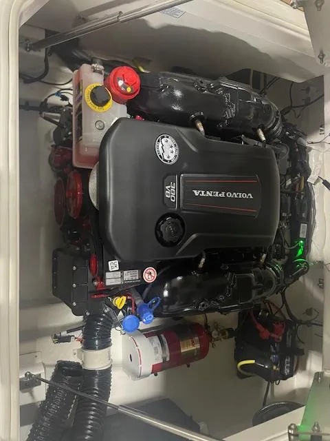 Slide: The Image of 2025 Chaparral 287 SSX engine compartment with Volvo Penta V8 engine. - 19