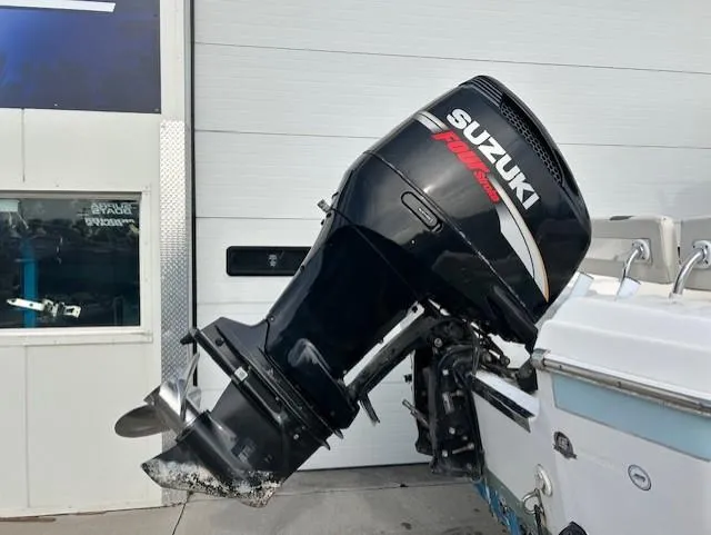 Slide: The Image of 2010 Carolina Skiff 25 Elite SS with Suzuki outboard motor. - 7