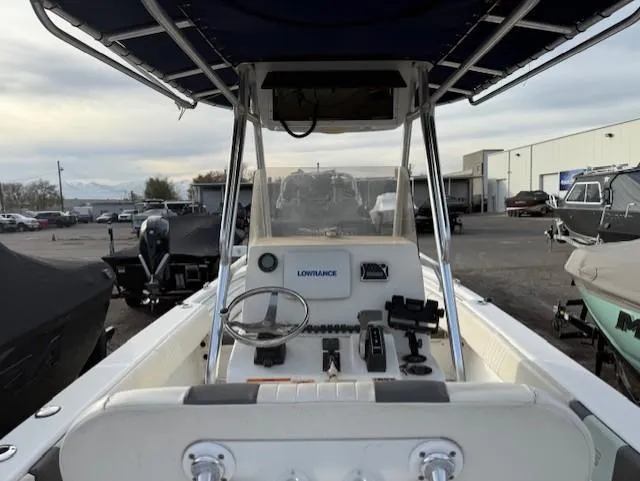 Slide: The Image of 2010 Carolina Skiff 25 Elite SS boat interior with steering console and equipment. - 9