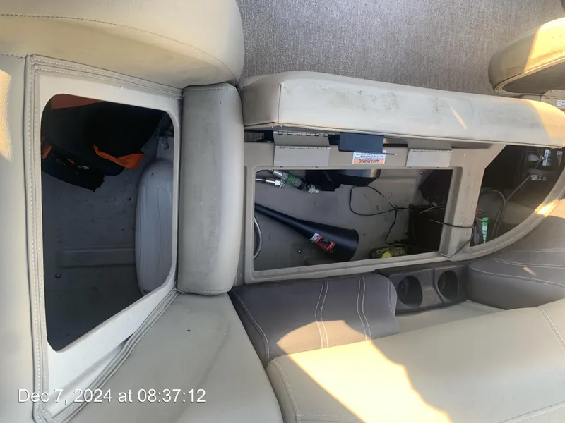 Slide: The Image of Red switch on 2021 Sylvan Mirage 8522 LZ boat interior panel. - 29