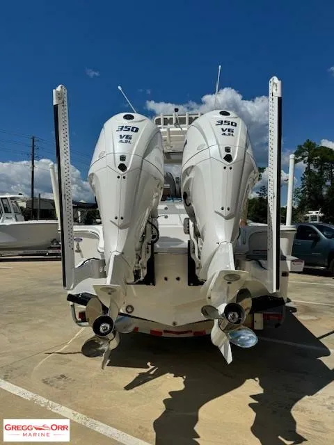 Slide: The Image of 2025 Regulator 30XO CROSSOVER boat with twin 350 V8 engines, rear view. - 5