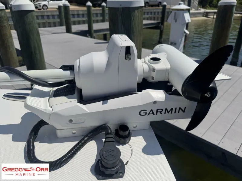 Slide: The Image of Garmin marine equipment on 2025 Regulator 30XO CROSSOVER boat at dock. - 7