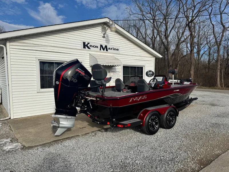 Slide: The Image of 2025 Vexus AVX1985S boat parked outside Knox Marine building. - 3