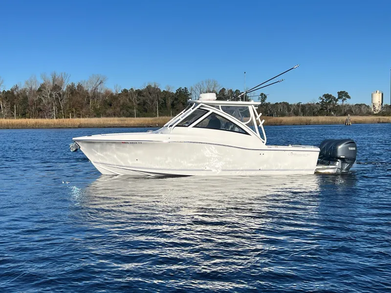 The Image of 2023 Albemarle 31 Dual Console boat on calm water. - 0