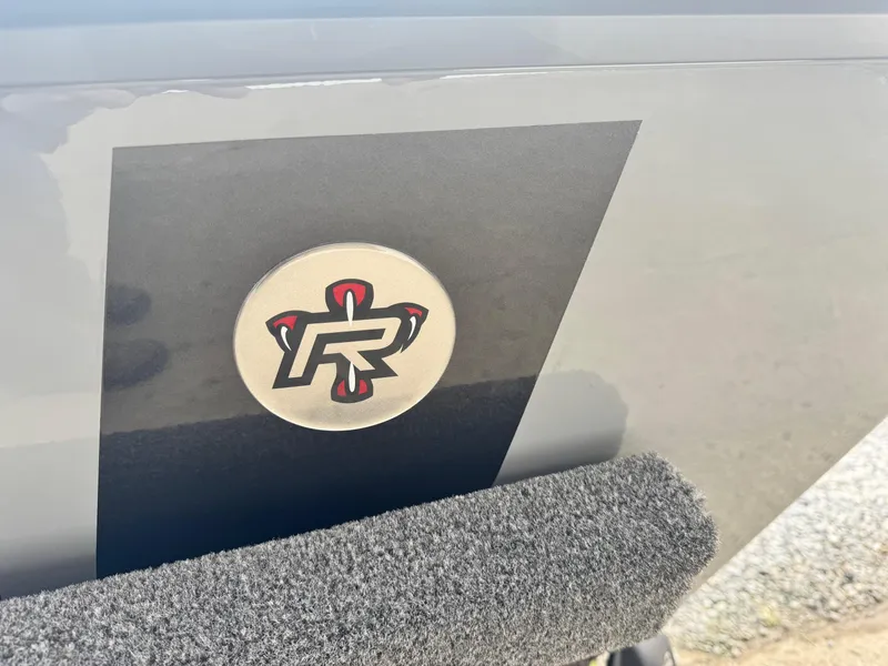 Slide: The Image of Vexus AVX1980 2025 model logo on a sleek black surface. - 11