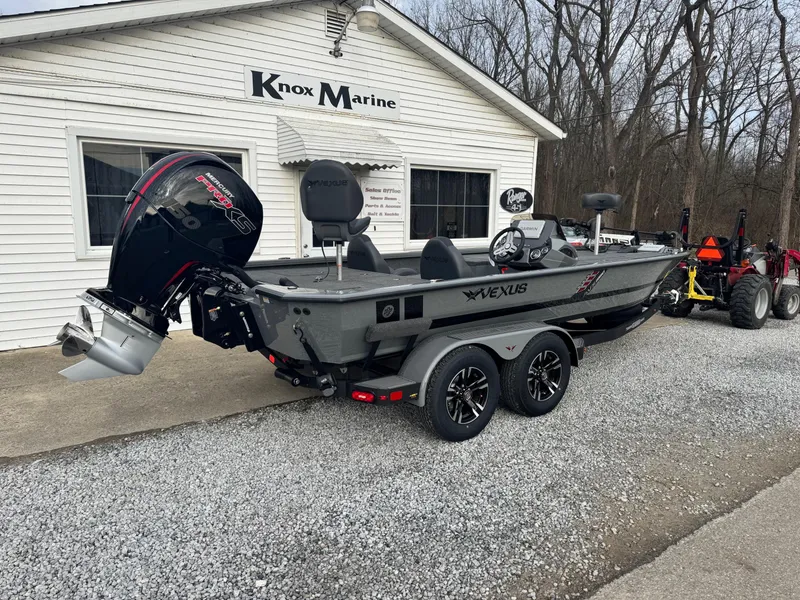 Slide: The Image of 2025 Vexus AVX1980 boat parked outside Knox Marine dealership. - 3