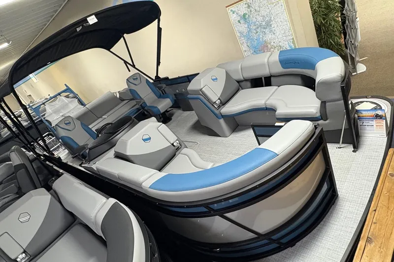 Slide: The Image of 2025 South Bay 500 pontoon boat with spacious seating and modern design. - 2