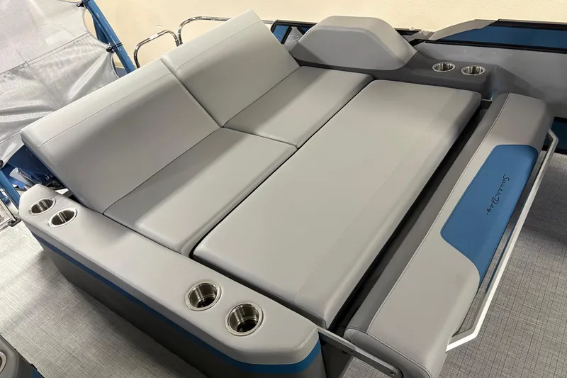 Slide: The Image of Luxurious seating on 2025 South Bay 500 boat with cup holders and sleek design. - 7