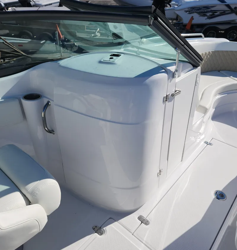 Slide: The Image of 2025 SouthWind 2400 SD boat interior with white seating and sleek design. - 16