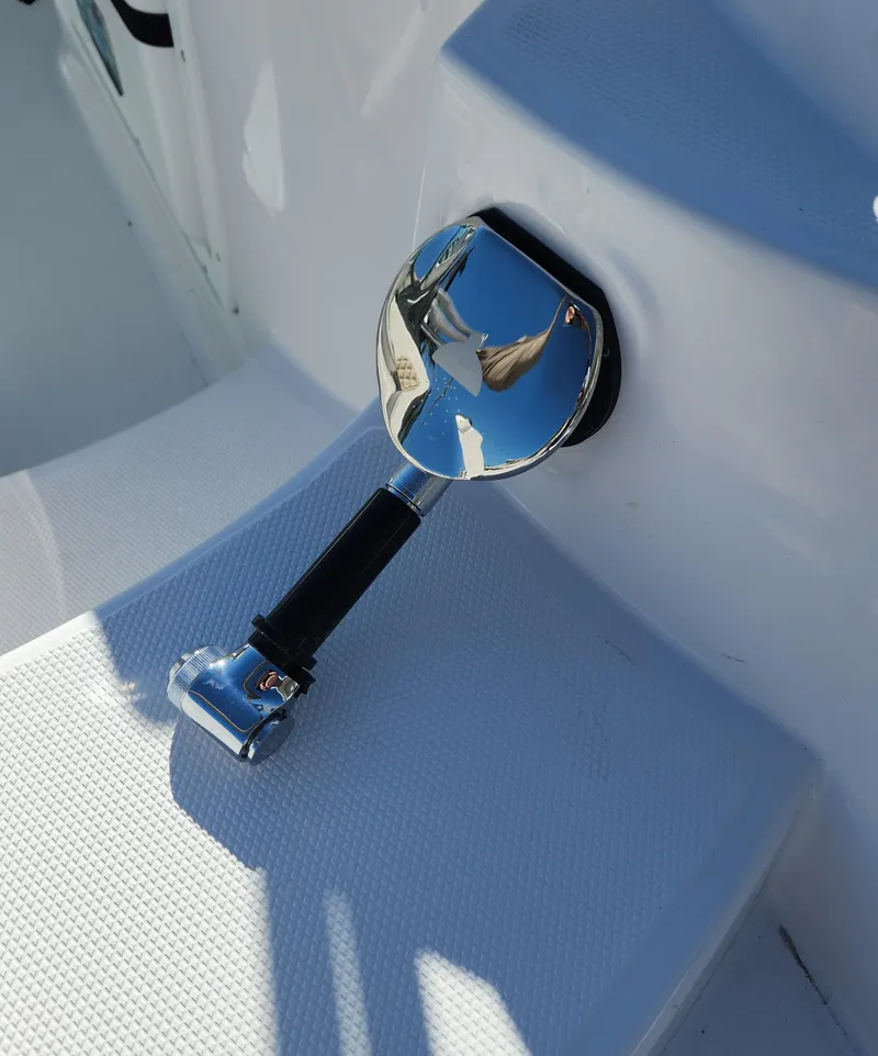Slide: The Image of Chrome boat cleat on 2025 SouthWind 2400 SD, reflecting sunlight. - 19
