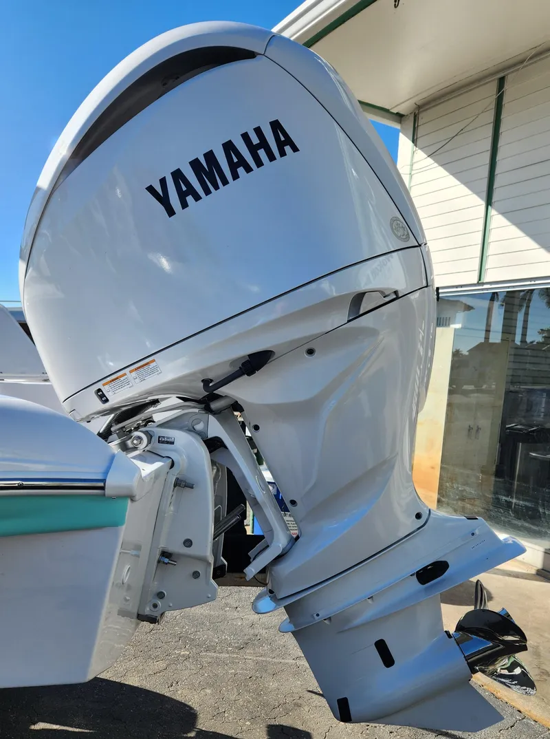 Slide: The Image of 2025 SouthWind 2400 SD with Yamaha outboard motor, side view. - 6