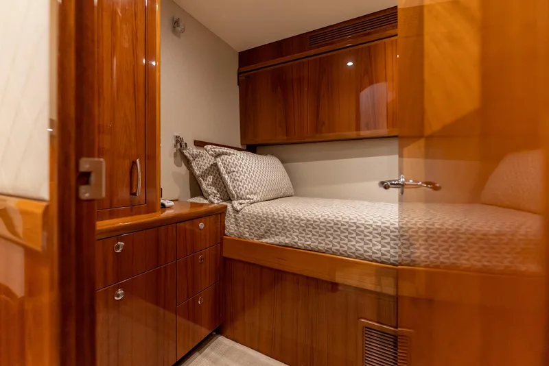 Slide: The Image of Luxurious cabin interior of 2018 Hatteras GT70 yacht with wooden furnishings. - 31
