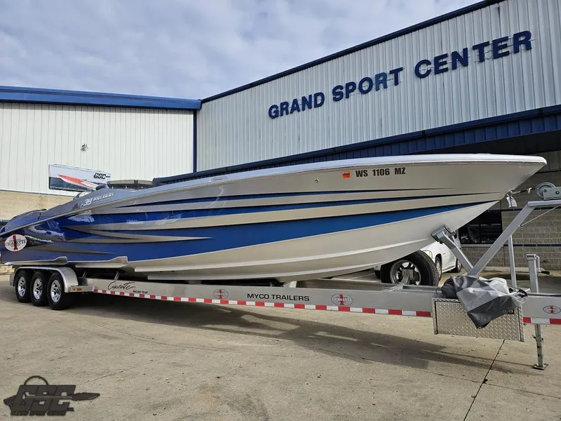 Slide: The Image of 2012 Cigarette 39' Top Gun Unlimited boat on trailer at Grand Sport Center. - 14