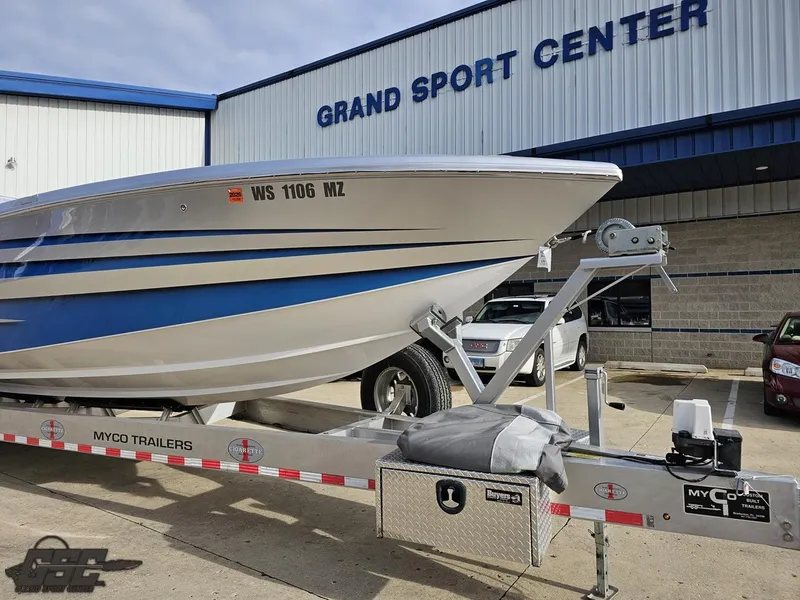 Slide: The Image of 2012 Cigarette 39' Top Gun Unlimited boat on trailer at Grand Sport Center. - 15