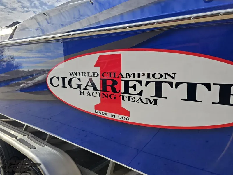 Slide: The Image of Close-up of 2012 Cigarette 39' Top Gun Unlimited boat with racing team logo. - 26