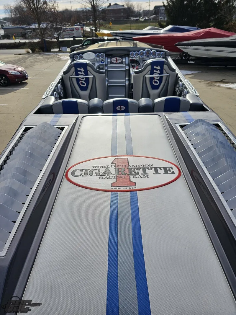 Slide: The Image of 2012 Cigarette 39' Top Gun Unlimited speedboat with custom interior and logo detailing. - 34