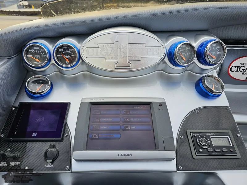 Slide: The Image of Dashboard of 2012 Cigarette 39' Top Gun Unlimited with gauges and Garmin display. - 46