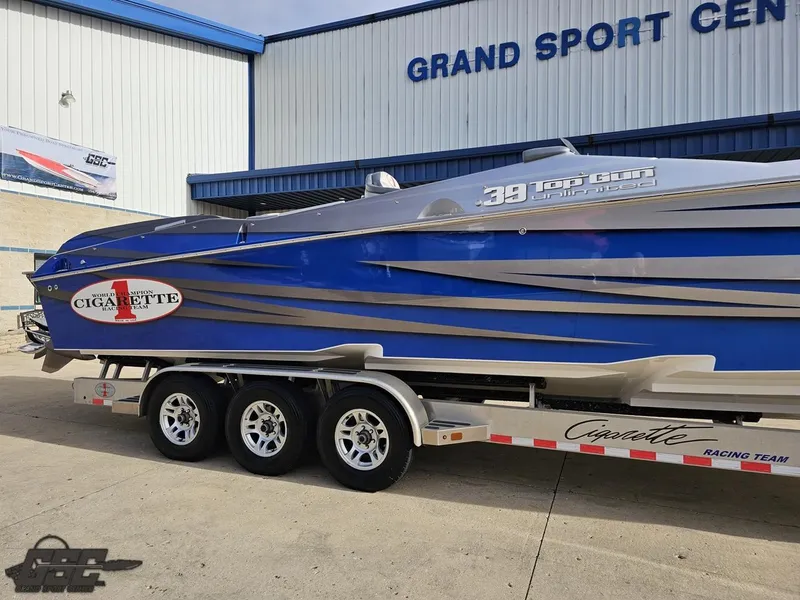 Slide: The Image of 2012 Cigarette 39' Top Gun Unlimited boat on trailer at Grand Sport Center. - 6