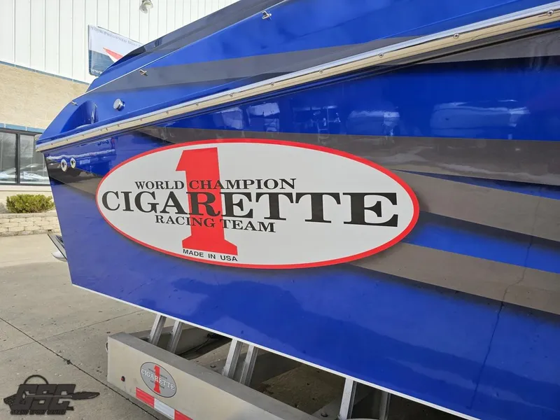 Slide: The Image of 2012 Cigarette 39' Top Gun Unlimited boat with racing team logo. - 9