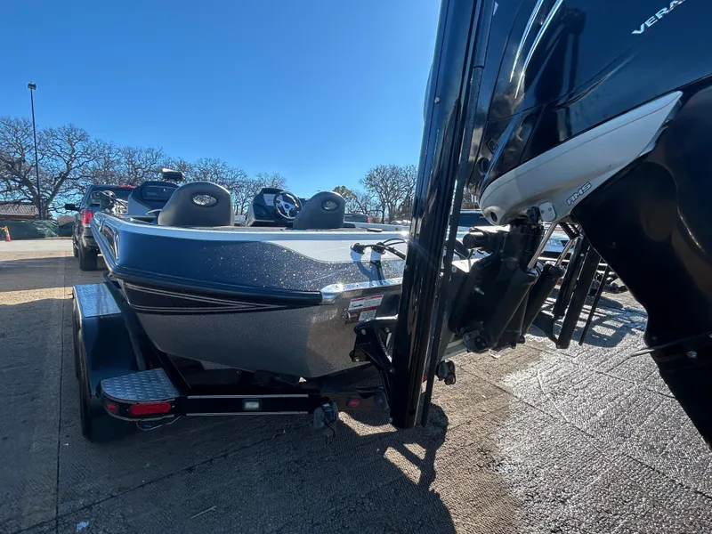 Slide: The Image of Boat trailer by the water, Champion 210 Elite, 2009 model. - 15