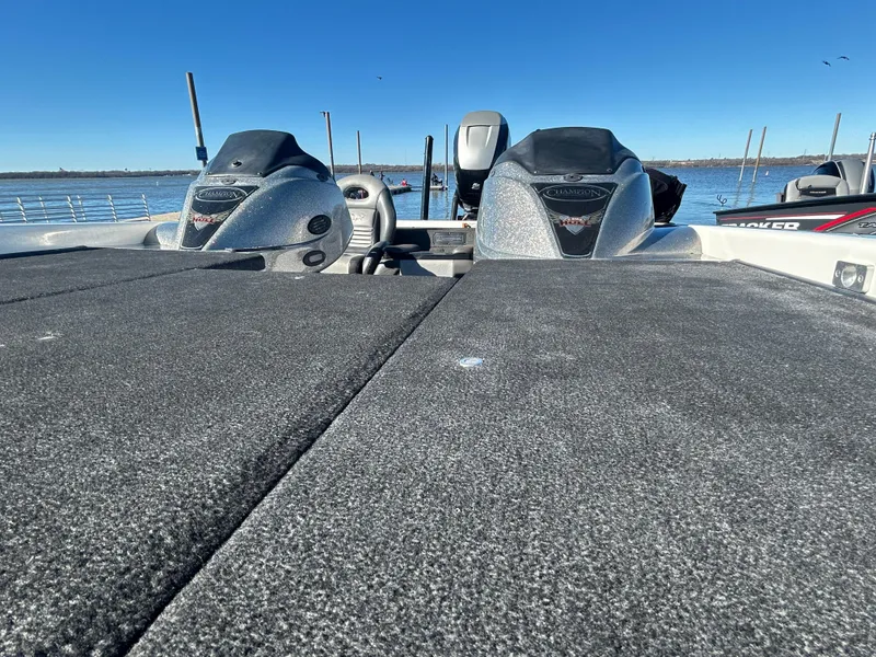 Slide: The Image of Mercury Marine Tempest Plus propeller on 2009 Champion 210 Elite boat. - 20