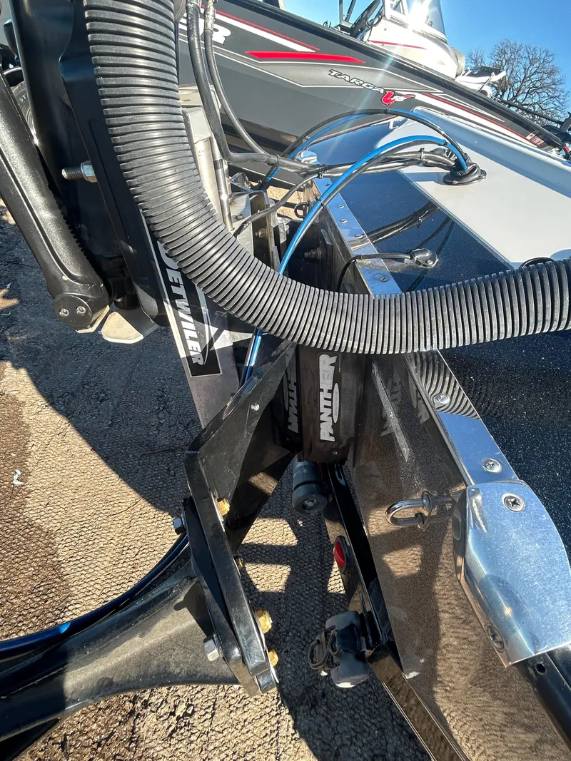 Slide: The Image of 2009 Champion 210 Elite boat deck with dual seats on a sunny day. - 27