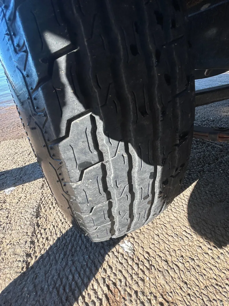 Slide: The Image of 2009 Champion 210 Elite boat engine with Cransh Auto Sales sticker. - 30