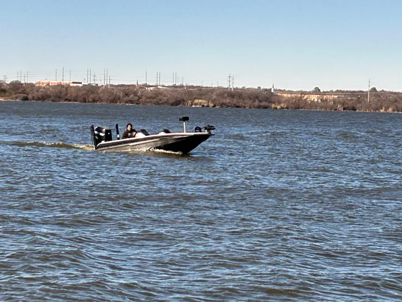 Slide: The Image of 2009 Champion 210 Elite trailer wheels on concrete surface. - 44