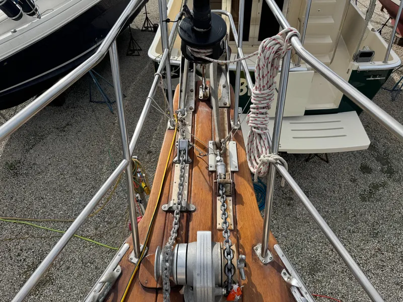 Slide: The Image of Bow view of 1999 Island Packet 45 sailboat with anchor chain and winch. - 13