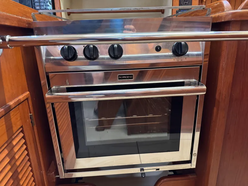 Slide: The Image of Stainless steel oven in 1999 Island Packet 45 yacht kitchen. - 23
