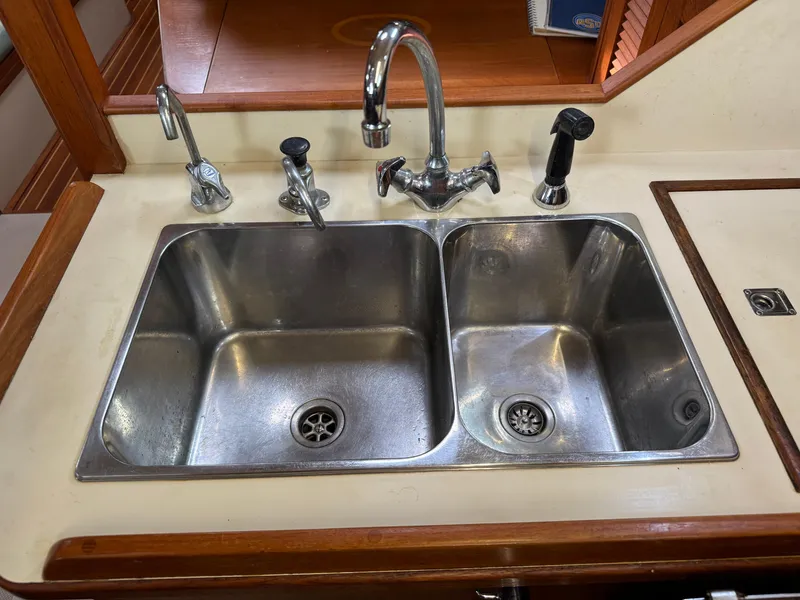 Slide: The Image of Stainless steel double sink in 1999 Island Packet 45 yacht kitchen. - 26