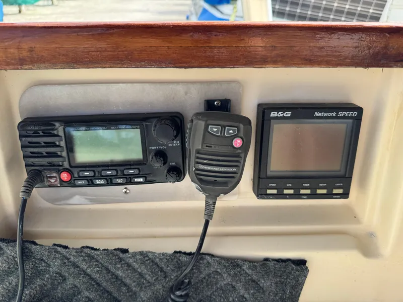 Slide: The Image of Control panel of a 1999 Island Packet 45 sailboat with radio and speed display. - 9