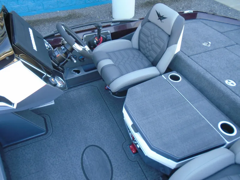 Slide: The Image of 2025 Vexus VXS20 boat interior with gray seating and console. - 11