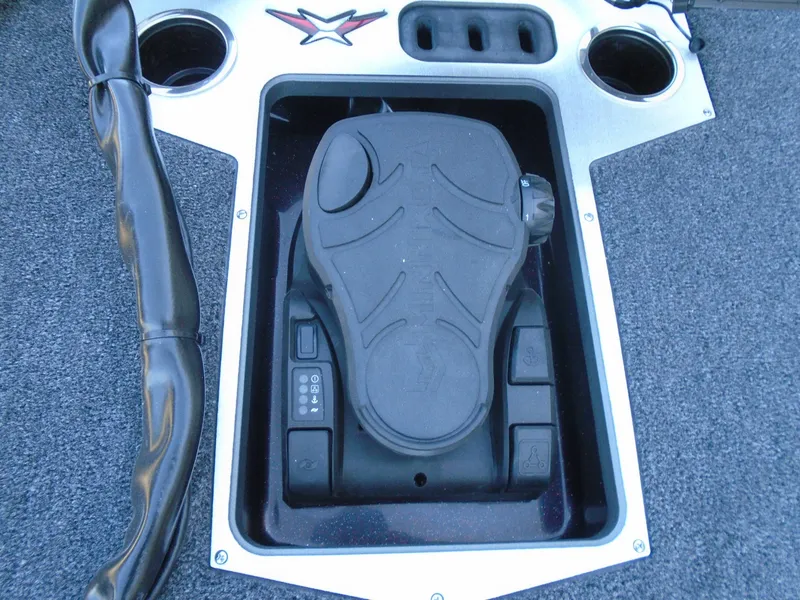 Slide: The Image of Vexus VXS20 2025 boat pedal control system with cup holders and textured surface. - 17