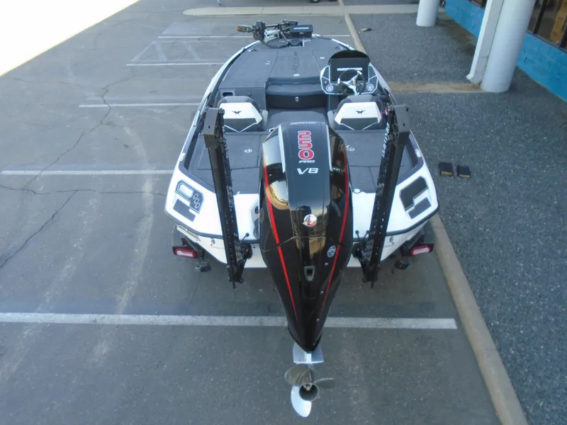 Slide: The Image of 2025 Vexus VXS20 boat with powerful V8 engine, parked in a lot. - 4