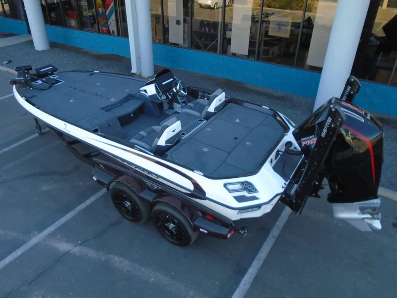 Slide: The Image of 2025 Vexus VXS20 boat on trailer, parked outdoors. - 6