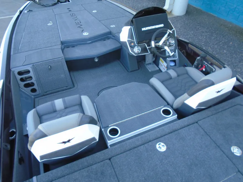Slide: The Image of 2025 Vexus VXS20 boat interior with modern seating and steering console. - 7