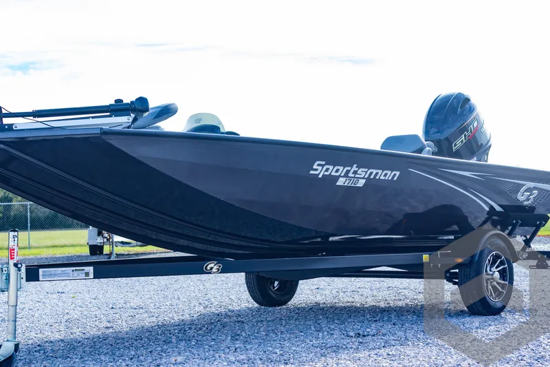 Slide: The Image of 2025 G3 Sportsman 1710 boat on trailer, sleek black design. - 10