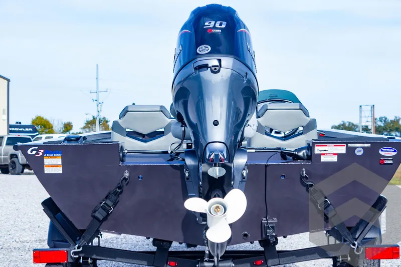 Slide: The Image of 2025 G3 Sportsman 1710 boat with powerful outboard motor, rear view. - 12