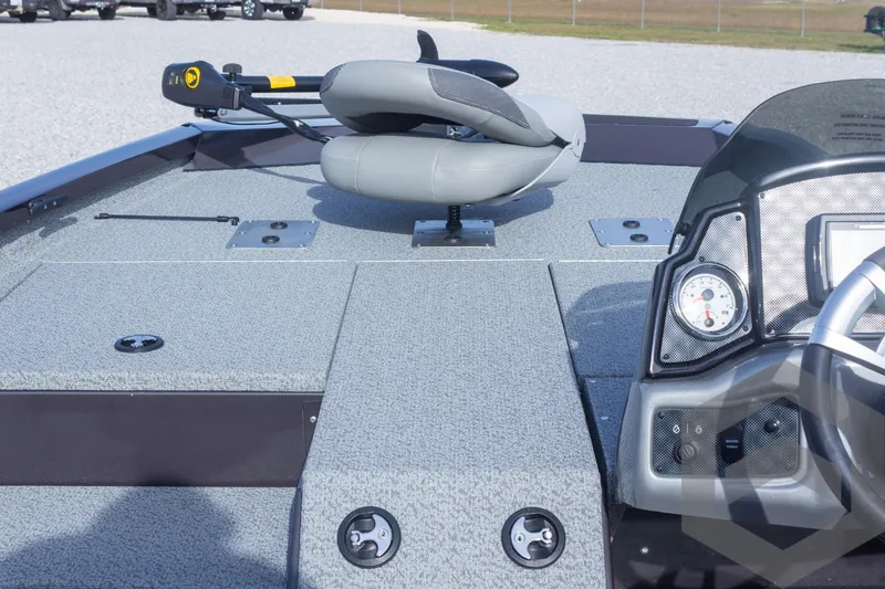 Slide: The Image of 2025 G3 Sportsman 1710 boat interior with steering console and seating. - 16