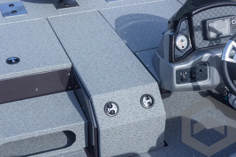 Slide: The Image of 2025 G3 Sportsman 1710 boat interior with dashboard and seating area. - 17